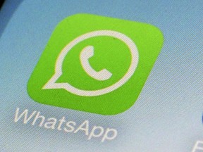 FILE - This Feb. 19, 2014, file photo, shows WhatsApp app icon on a smartphone in New York.