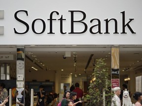 FILE - The logo of Japanese mobile provider SoftBank is seen at its shop in Tokyo on June 14, 2018.