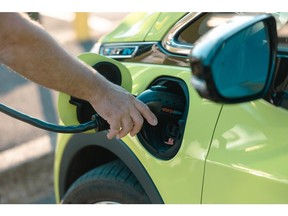A driver plugs in their Chevrolet Bolt at a ChargePoint electric vehicle charging station in Hudson, New York, US, on Tuesday, Sept. 3, 2024. ChargePoint Holdings Inc. is scheduled to release earnings figures on September 4.