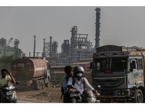 Oil tanker trucks outside an oil refinery operated by Bharat Petroleum Corp. Ltd., in Mumbai, India, on Friday, April 4, 2025. Indian refiners have rushed back to the market to seek crude supply after President Donald Trump's threat of more penalties against Russia raised concerns over potential disruptions to oil flows.