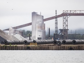 Rolled coils of steel in the yard at Algoma Steel Inc. along the St. Marys River in Sault Ste. Marie, Ont.