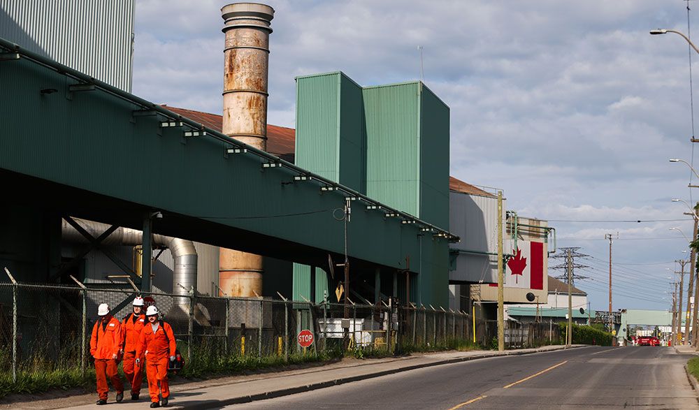 Workers leave ArcelorMittal Dofasco's steel mill in Hamilton, Ont.