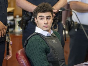 FILE - Luigi Mangione, accused of fatally shooting the UnitedHealthcare CEO Brian Thompson in New York City and leading authorities on a five-day search, appears in court for a hearing, Feb. 21, 2025, in New York.