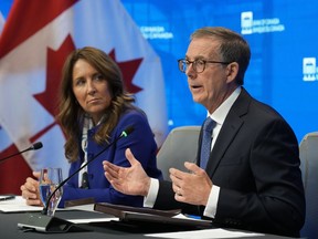 Bank of Canada Governor Senior Deputy Governor Carolyn Rogers looks on as Tiff Macklem responds to a question during a news conference in Ottawa, Wednesday, Sept. 17, 2025.