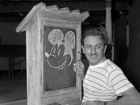 FILE - Walt Disney, creator of Mickey Mouse, poses at the Pancoast Hotel in Miami, Fla., on Aug. 13, 1941. (AP Photo, File)