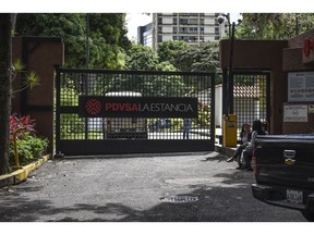 Signage is displayed at a Petroleos de Venezuela SA (PDVSA) facility in the Altamira neighborhood of Caracas, Venezuela, on Wednesday, July 31, 2019. A U.S. appeals court ruled on Monday that Crystallex International Corp. may seize U.S.-based stock of Citgo Petroleum Corp.'s parent, which is part of Venezuela's state-owned oil company, to cover a $1.4 billion award over the nationalization of gold fields.