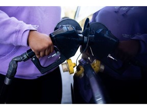A driver refuels their vehicle at a Citgo gas station in Royal Oak, Michigan, US, on Thursday, Sept. 19, 2024. Steadily falling gasoline prices are providing a tailwind for US Vice President Kamala Harris' campaign for the nation's highest office as Donald Trump seeks to rile inflation-weary consumers by attacking her record on energy.