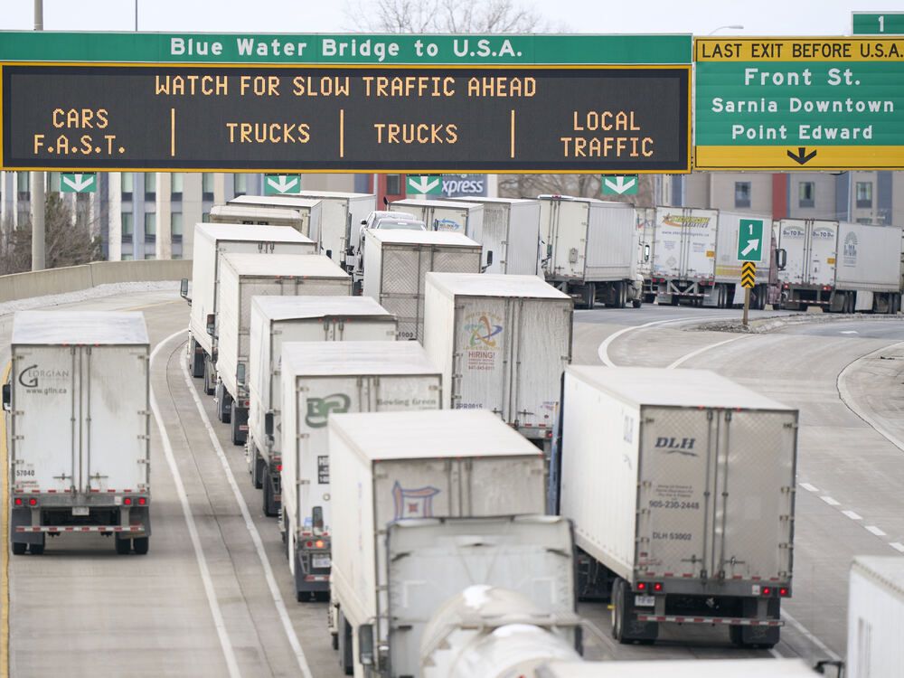 https://smartcdn.gprod.postmedia.digital/financialpost/wp-content/uploads/2025/10/1022-mg-trade-trucks.jpg