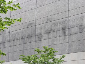 Stains on a the side of where the now bankrupt Hudson’s Bay signage once adorned the stores location on Bloor Street at Yonge Street in Toronto on June 5, 2025.