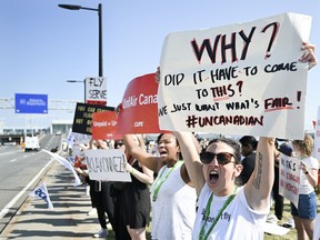 Air Canada flight attendants strike outside Montreal–Trudeau International Airport in Montreal, Saturday, Aug. 16, 2025.