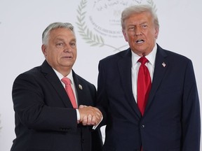 President Donald Trump greets Hungary's Prime Minister Viktor Orban during a summit to support ending the more than two-year Israel-Hamas war in Gaza after a breakthrough ceasefire deal, Monday, Oct. 13, 2025, in Sharm El Sheikh, Egypt.