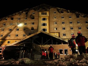 FILE - Firefighters and emergency teams work after a fire that broke out at a hotel in the ski resort of Kartalkaya, located in Bolu province, northwest Turkey, on Jan. 21, 2025.