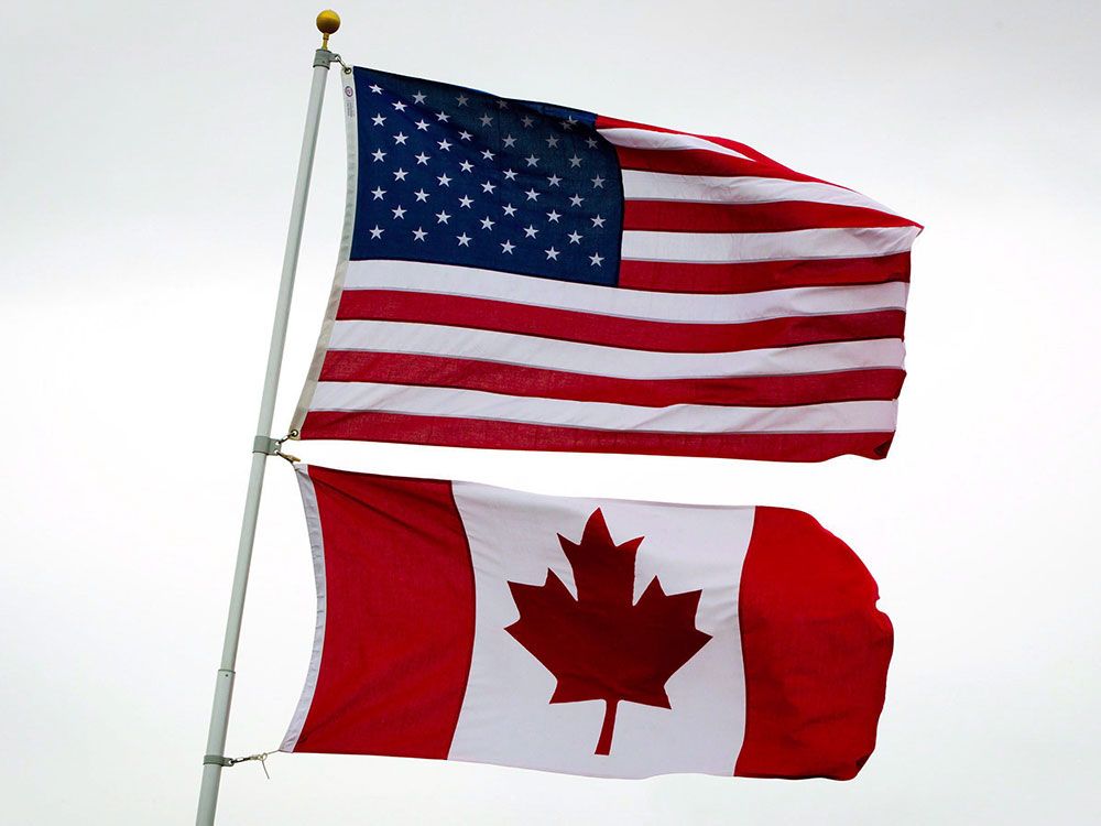 https://smartcdn.gprod.postmedia.digital/financialpost/wp-content/uploads/2025/10/flags-1016-ph.jpg