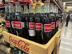 Coca-Cola Co. posted third-quarter sales growth that beat Wall Street expectations.