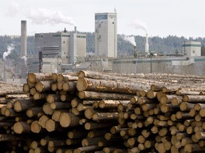 Logs are piled up at West Fraser Timber Co. Ltd. in Quesnel, B.C.