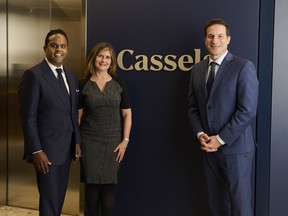 Marco Mendicino, former chief of staff to Prime Minister Mark Carney, right, with Kristin Taylor, managing partner, middle, and Noble Chummar, deputy managing partner of Cassels Brock & Blackwell LLP.