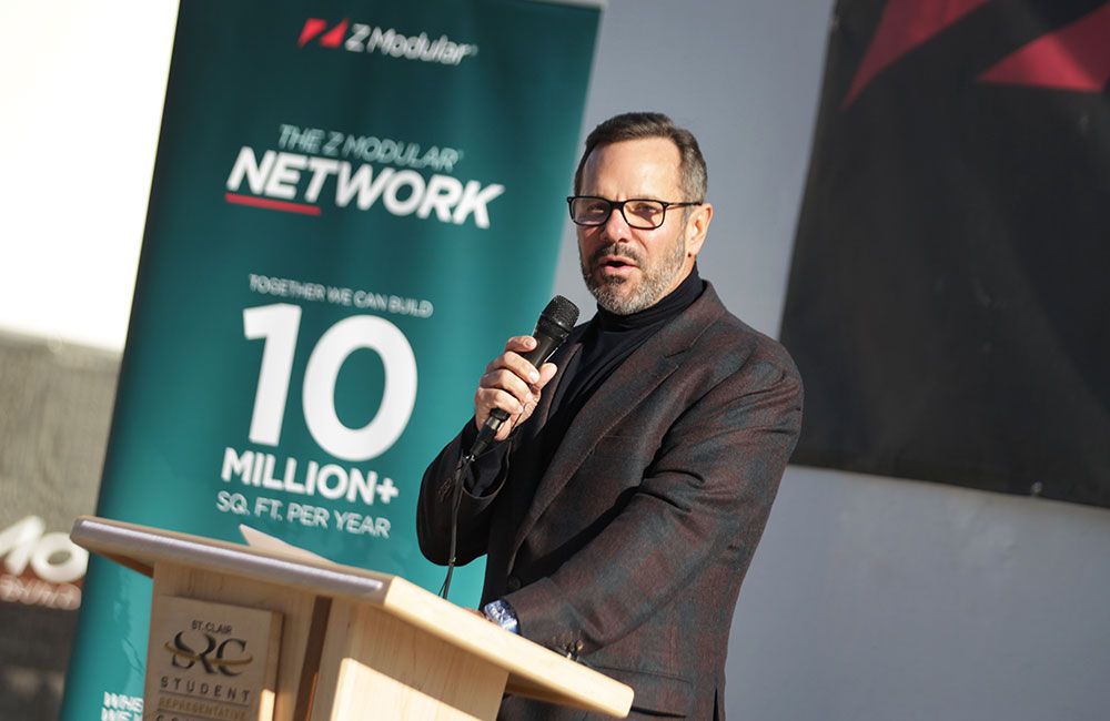 Zekelman in 2020 speaks at St. Clair College in Windsor about the construction of modular units for a new residence building.