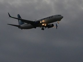 An United Airlines flight arrives at O'Hare International Airport in Chicago, Monday, Nov. 3, 2025.