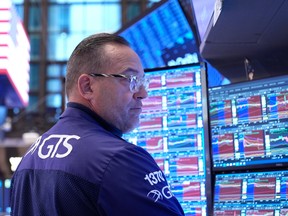 Anthony Matesic works on the floor at the New York Stock Exchange in New York on Nov. 11, 2025.