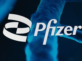 FILE - The Pfizer logo is displayed at the company's headquarters, Friday, Feb. 5, 2021, in New York.
