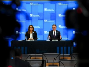 Tiff Macklem, governor of the Bank of Canada, and Carolyn Rogers, senior deputy governor, hold a press conference in Ottawa after the rate decision on Oct. 29.