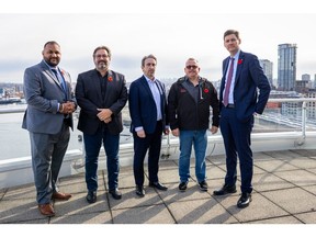 B.C.'s forestry minister Ravi Parmar, Scott Lunny (USW Western Canada Director), Gavin McGarrigle (Unifor Western Regional Director), Geoff Dawe (PPWC President) join Premier David Eby at the B.C. Forestry Summit in Vancouver.