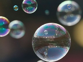 The stadium is reflected in bubbles seen ahead of the English Premier League football match between West Ham United and Chelsea at The London Stadium, in east London on Dec. 9, 2017.