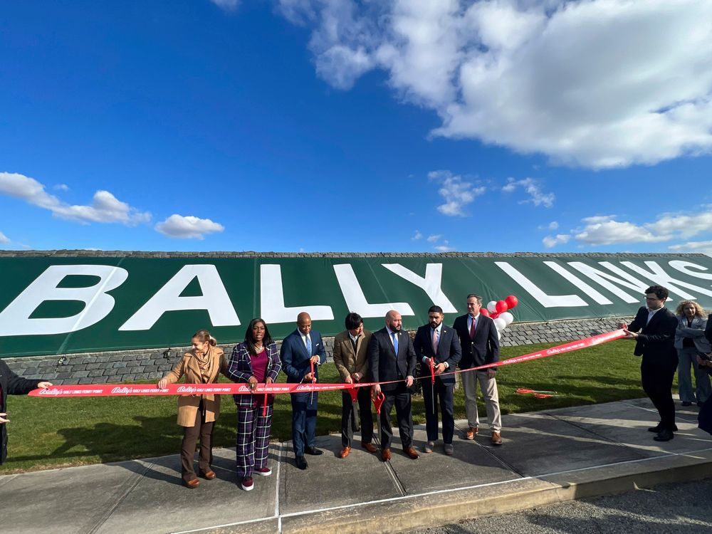 FILE - In this photo provided by the Office of the Mayor of New York, Mayor Eric Adams, third left, participates in the ribbon cutting ceremony and sign unveiling of Bally Links, formerly Trump Links, at Ferry Point in the Bronx borough of New York, Thursday, Jan. 11, 2024.
