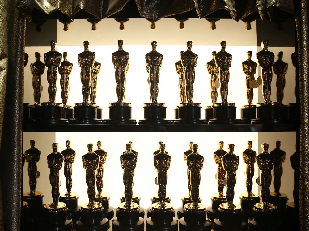 FILE - Oscar statuettes appear backstage at the Oscars at the Dolby Theatre in Los Angeles on Feb. 28, 2016.