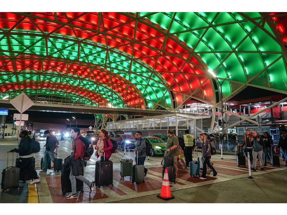 Travelers at Hartsfield-Jackson Atlanta International Airport (ATL) in Atlanta on Dec. 23.