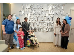 World's first international patient, who received intrathecal gene therapy at Medcare Royal Hospital in Dubai, UAE, along with parents, and the hospital team.