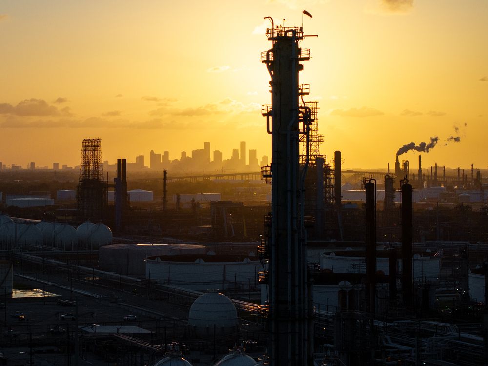 Oil falls near US$60 as signs of surplus offset geopolitics