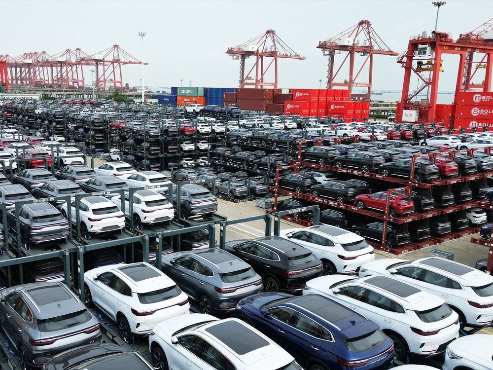 BYD electric cars waiting to be loaded on a ship are stacked at the international container terminal of Taicang Port at Suzhou Port, in China's eastern Jiangsu Province.