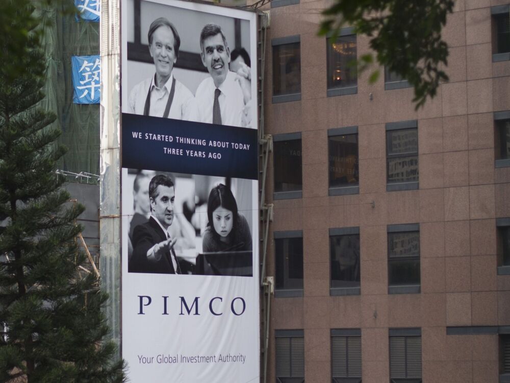 A Pacific Investment Management Company LLC (PIMCO) advertisement is displayed on a building in Hong Kong, China, on Nov. 13, 2013.