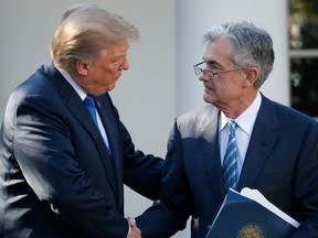 U.S. President Donald Trump shakes hands with Federal Reserve board member Jerome Powell after announcing him as his nominee for the next chair of the Federal Reserve, in the Rose Garden of the White House in Washington, Nov. 2, 2017.
