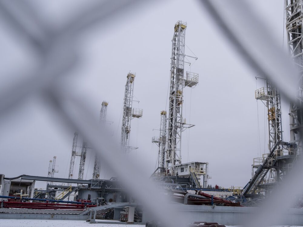 Idle oil drilling rigs in the snow at a lot near Midland, Texas, U.S, on Feb. 13, 2021.