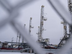 Idle oil drilling rigs in the snow at a lot near Midland, Texas, U.S, on Feb. 13, 2021.