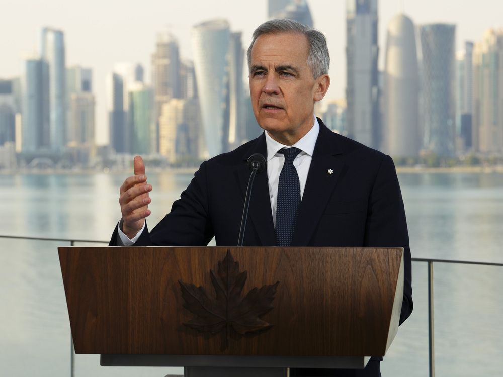 Prime Minister Mark Carney holds a press conference at the Islamic Art Museum in Doha, Qatar, on Jan. 18, 2026. 