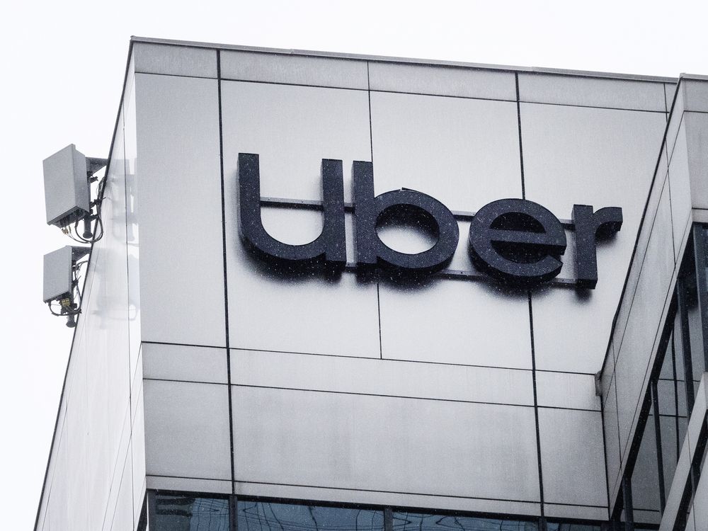 Signage for Uber on Toronto’s Bloor Street West on July 11, 2023.