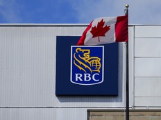 A Royal Bank of Canada sign and a Canada flag are pictured in Ottawa on June 27, 2024.