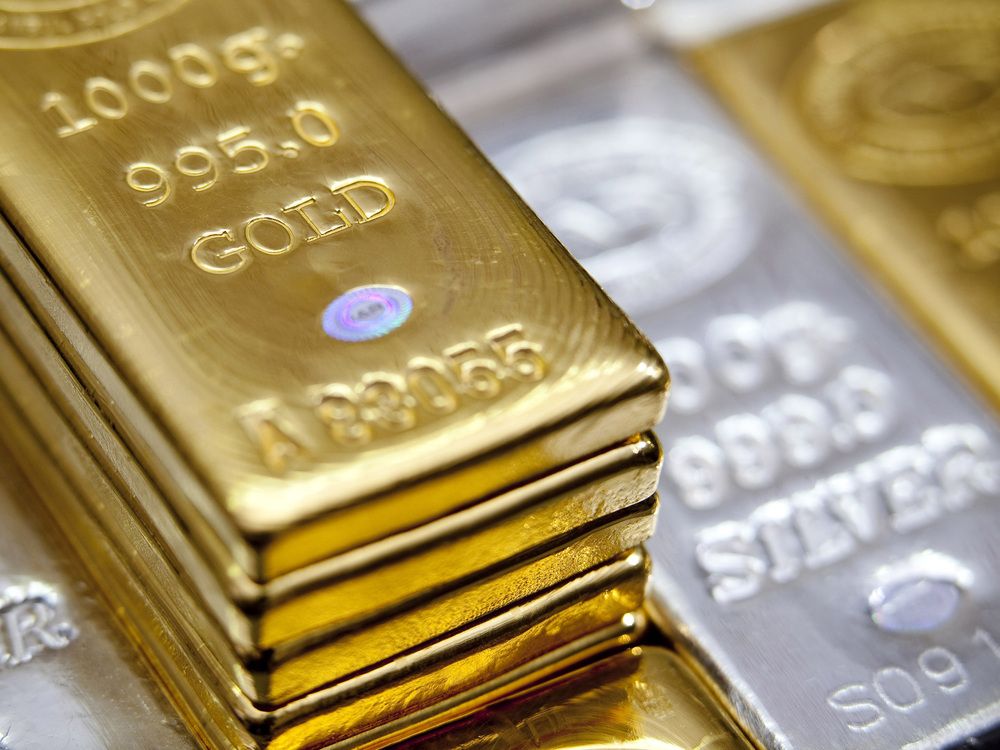 One thousand gram gold bars and five hundred gram silver bars sit at the Istanbul Gold Refinery in Istanbul, Turkey.