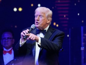 President Donald Trump speaks at a New Year's Eve celebration at his Mar-a-Lago club, Wednesday, Dec. 31, 2025, in Palm Beach, Fla.