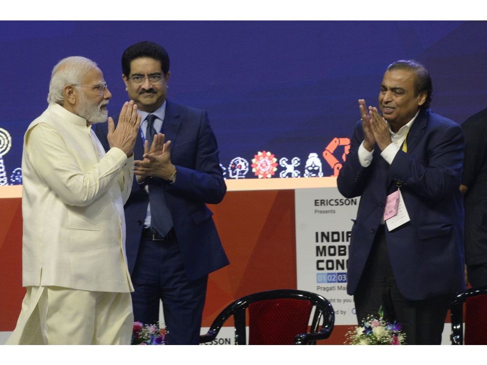 Narendra Modi, left, and Mukesh Ambani in New Delhi in 2022.