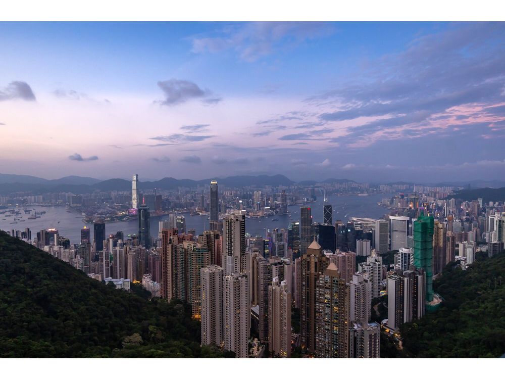 China Weighs Tighter Rules for Firms to List in Hong Kong