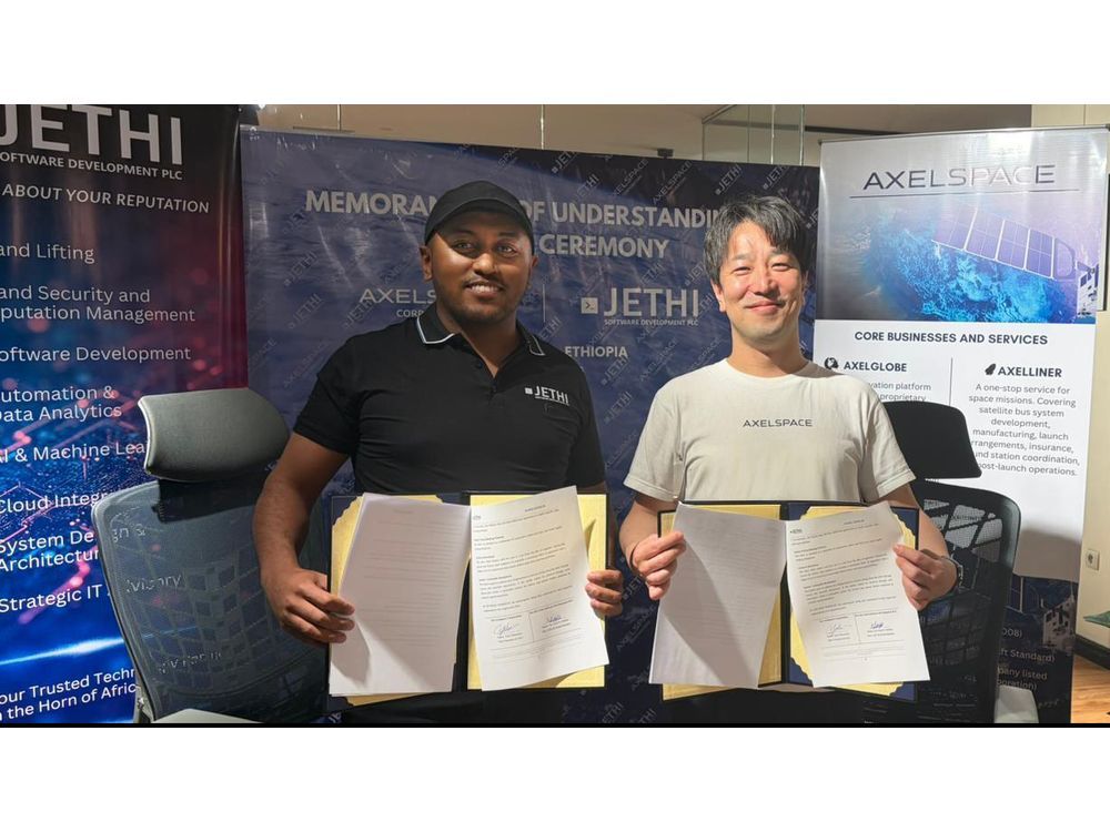 Naol Debele, Chief Executive Officer of Jethi (left), and Yuya Nakamura, President and CEO of Axelspace, at the signing ceremony on January 13 in Ethiopia