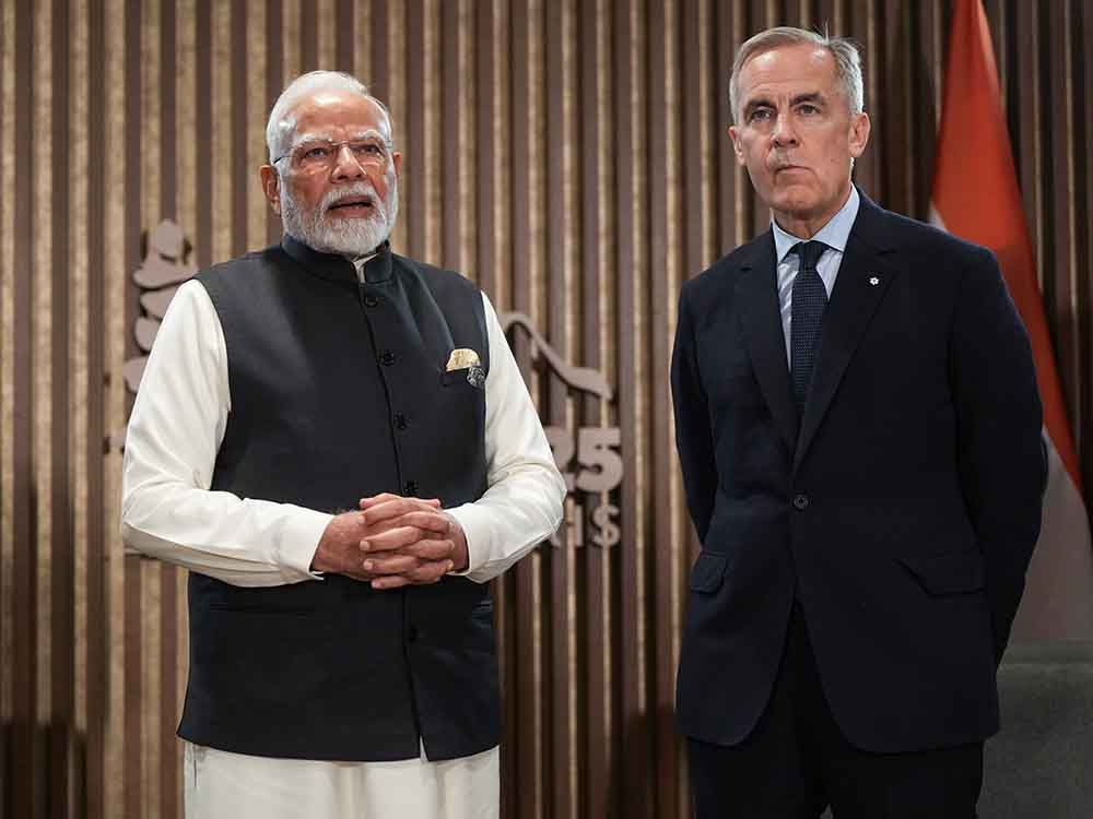 https://smartcdn.gprod.postmedia.digital/financialpost/wp-content/uploads/2026/01/carney-modi-gs0127.jpg