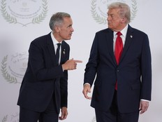 U.S. President Donald Trump greets Prime Minister Mark Carney during a summit, Oct. 13, 2025, in Sharm El Sheikh, Egypt.