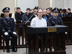 Robert Lloyd Schellenberg sits in the dock in a Chinese court in 2019