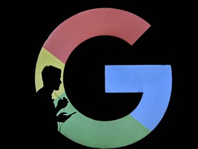 A man walks past the Google signage outside the US tech giant's Ananta office in Bengaluru.