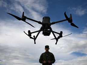 A Columbian soldier operates a drone during the activation of the first unmanned aircraft battalion at the military base Tolemaida.